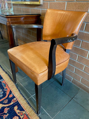 2 Orange Leather Armchairs