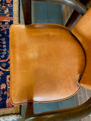 2 Orange Leather Armchairs