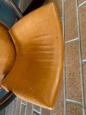 2 Orange Leather Armchairs