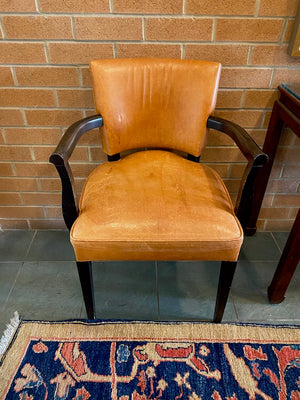 2 Orange Leather Armchairs
