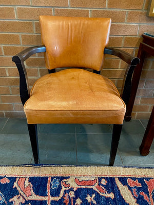 2 Orange Leather Armchairs