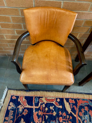 2 Orange Leather Armchairs