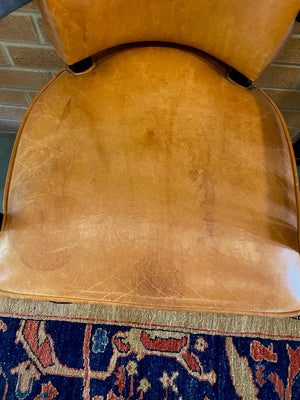 2 Orange Leather Armchairs