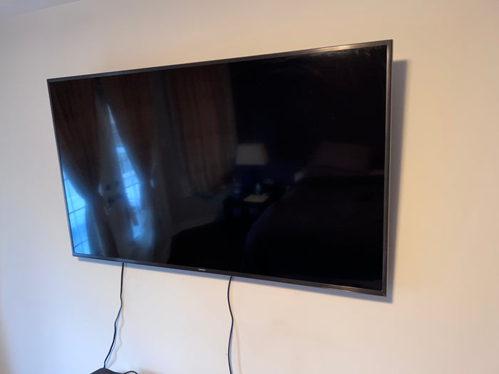 Samsung 55-Inch 4K Ultra HD Smart LED TV.