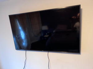 Samsung 55-Inch 4K Ultra HD Smart LED TV.