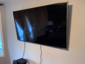 Samsung 55-Inch 4K Ultra HD Smart LED TV.