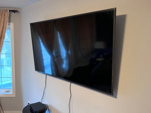 Samsung 55-Inch 4K Ultra HD Smart LED TV.