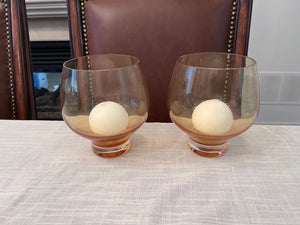 Pair of Orange Tinted Glass Candle Holders