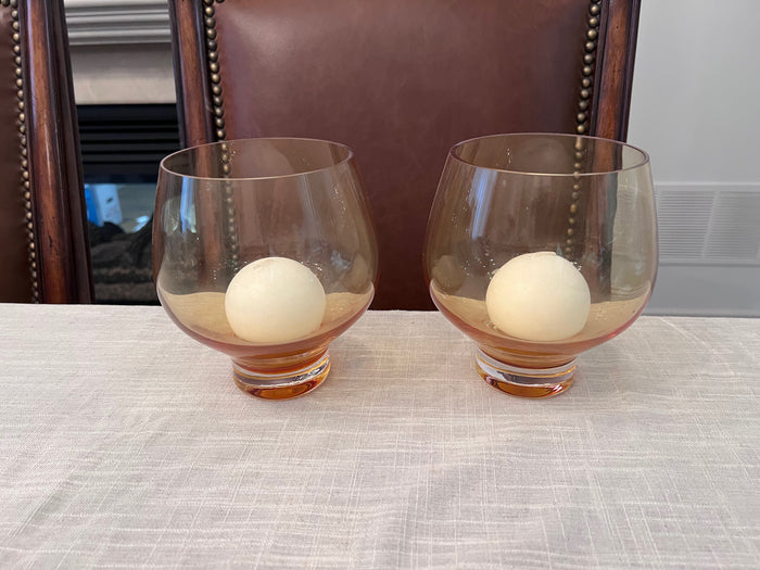 Pair of Orange Tinted Glass Candle Holders