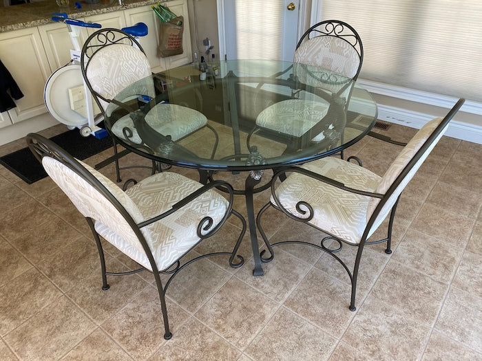 Wrought iron glass top table and chairs discount