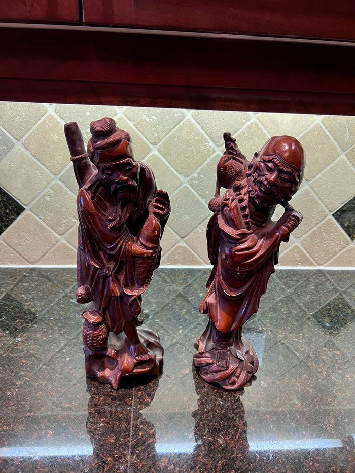 Pair of Oriental Wood Carvings