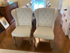 2 Beige Tufted Wingback Upholstered Chairs