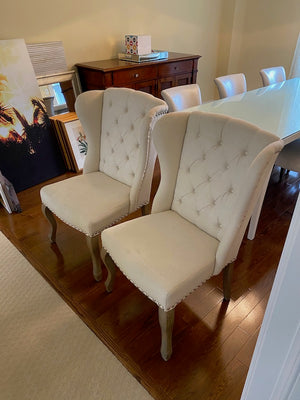 2 Beige Tufted Wingback Upholstered Chairs