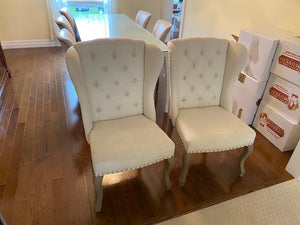2 Beige Tufted Wingback Upholstered Chairs