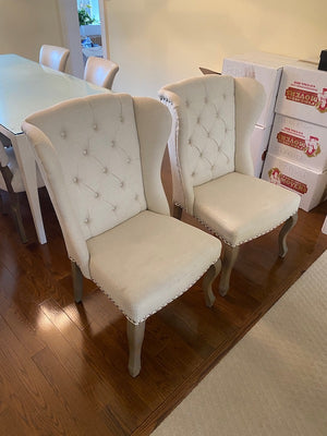 2 Beige Tufted Wingback Upholstered Chairs