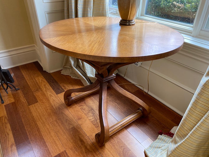 Oval Shaped Wood Accent table with ornate base