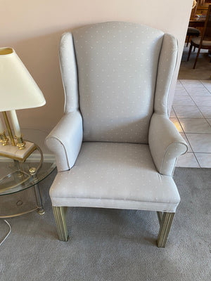 Cream Upholstered Wingback Chair