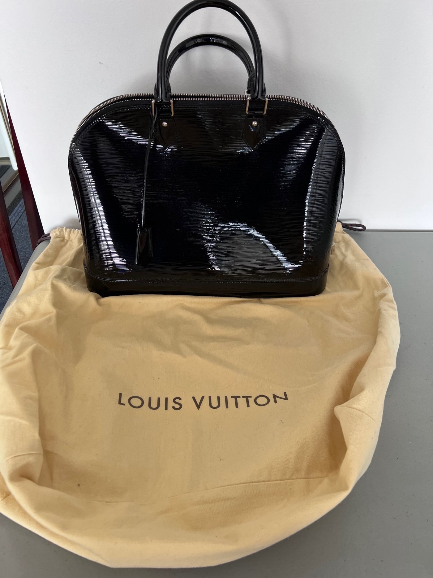 Louis Vuitton Black Electric Epi Leather Alma PM – Sell My Stuff