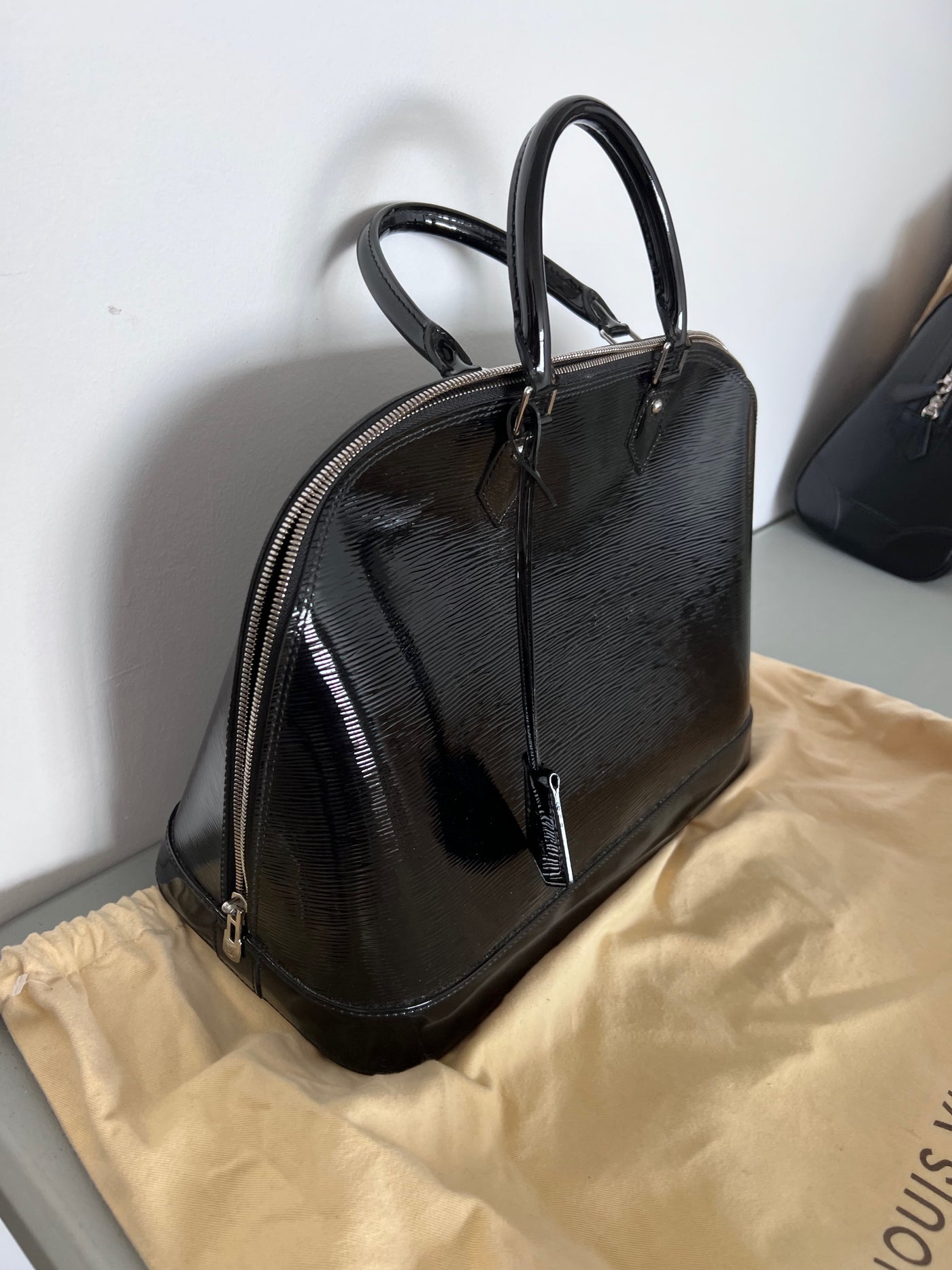 Louis Vuitton Black Electric Epi Leather Alma PM – Sell My Stuff