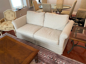 Cream Coloured Upholstered Love Seat
