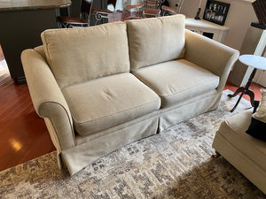 Beige Upholstered Love Seat