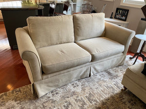 Beige Upholstered Love Seat