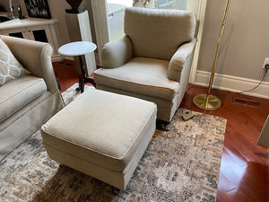 Beige Upholstered Armchair + Ottoman, on Casters