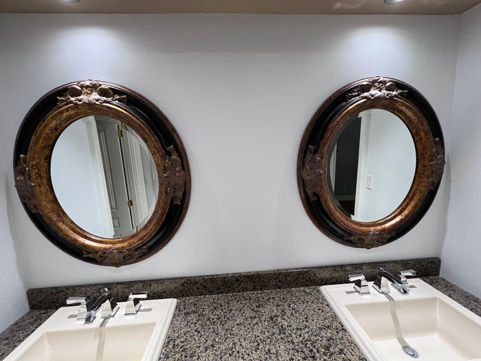 Pair of Black & Gold Oval Mirrors