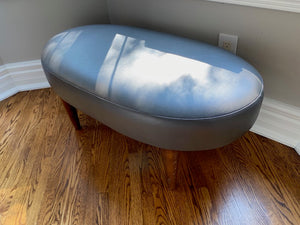 Grey Leather Oval Shaped Ottoman