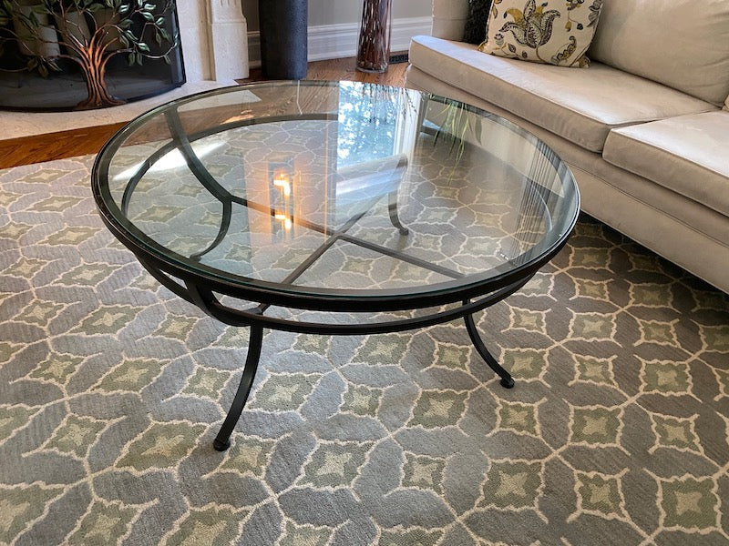 Iron and glass round coffee deals table