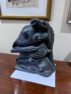 Inuit Soapstone Sculpture/Carving- 'Mythical Creature Eating Seals'