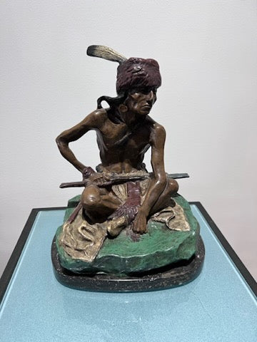 Charles Marion Russell Cold Painted Bronze Sculpture- "Indian Man Seated with Rifle"