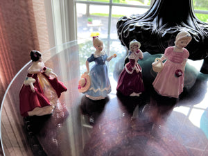 4 Small Royal Doulton Figurines