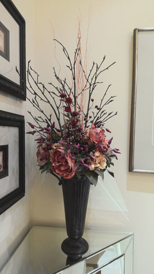 Dried flowers in metal urn